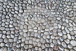 Old stone wall. Rough stones of different shapes. Stone background.