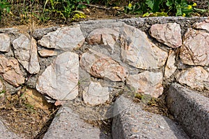 The old stone wall texture.