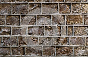 Old stone wall with uneven decorative joints