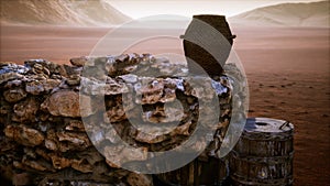 Old stone water well in the desert