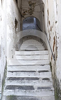 Old stone way up staircase in the medieval Amalfi town