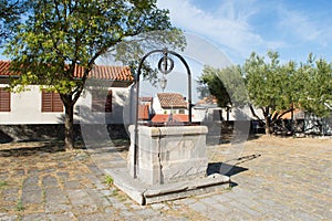 Old stone well in Biograd, Croatia