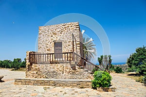 Old stone windmill near the monastery Toplou, Crete