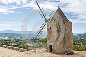 Old stone windmill in Saint Saturnin les Apt
