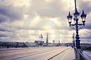 Old stony bridge in Bordeaux photo