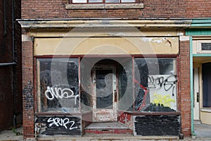 Old storefront with graffiti