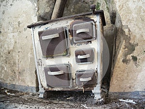 Old stove in abandoned rural farm