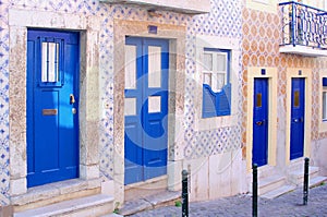 Traditional blue street doors old tiles, Barrio Alto, Lisbon photo