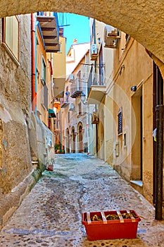 Old street in Cefalu in Sicily