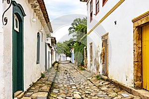 Old street with historic colonial-style houses