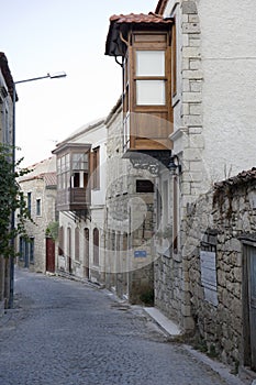 Old street and house in Alacati,