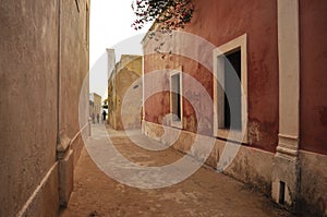 Old street with houses on island of mozambique photo