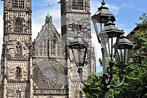 Old street lamp and Lorenz church in Nuremberg