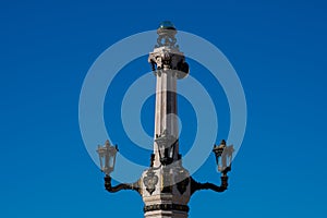 Old street lamp at The Marquess of Pombal Square Praca do Marques de Pombal photo