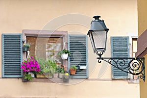 Old street lamps with windows in the background, Strasbourg, France