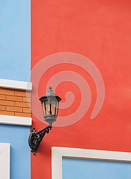 Old street lantern on wall.