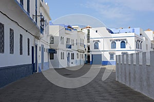 Old street  in the medina of Asilah near the rampart photo
