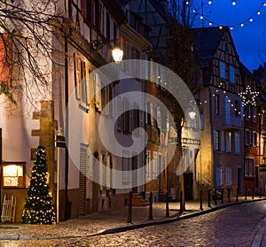Old street at night in winter, Colmar, France