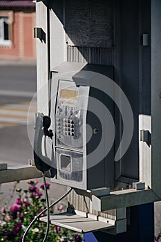 Old street, public push-button payphone.Retro technology