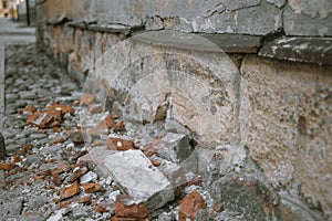 Old street with red broken bricks