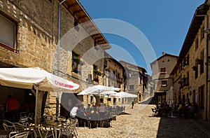 Old street with restorain in Frias. Burgos