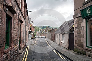 An old street with stone houses in the town of Melrose in Scotland