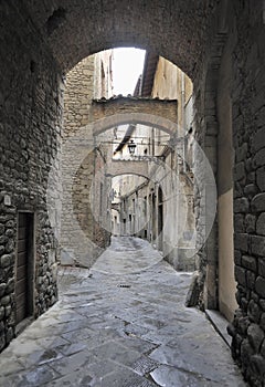 Old street in the town of Pistoia, Italy