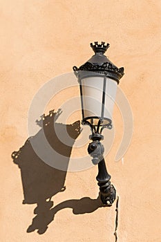 Old streetlamp with shadow
