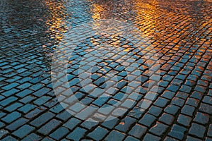 Old Streets Cobblestone Abstract Background. Wet Stones In Evening