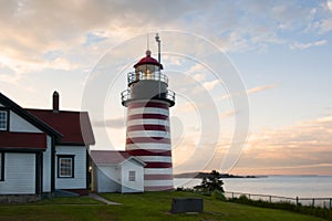 Old Striped Lighthouse Tower Sines Brightly in Maine