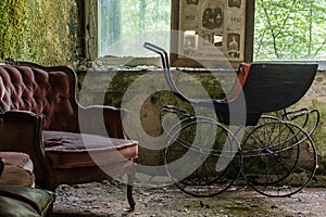 old stroller in a abandoned house detail