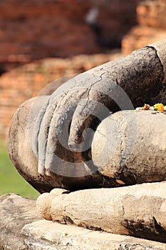 Old stucco Buddha hands