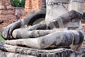 Old stucco Buddha hands