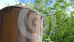 Old style concrete water tower for agriculture and farming purpose.