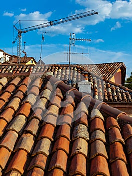 Old style house roof with blue sky photo