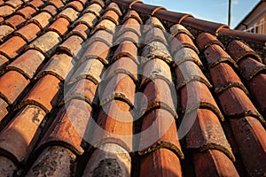 Old style house roof with blue sky photo