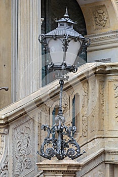 Old style iron street lamp .