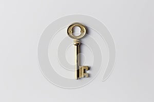 An old style key, on isolated color background. Ai generated