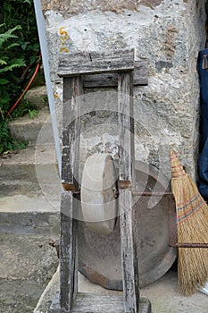 Old-style knife sharpening tool made of stone