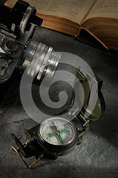 Old style photograph camera and compass