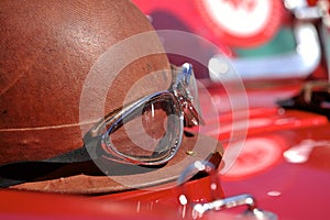 Old style race helmet on racing car