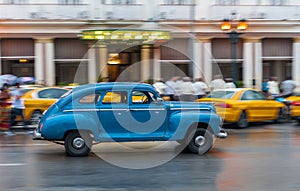 HAVANA, CUBA - OCTOBER 21, 2017: Old Style Retro Car in Havana, Cuba. Public Transport Taxi Car for Tourist and Local People. Blue