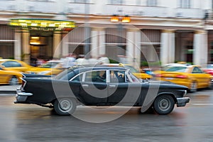 HAVANA, CUBA - OCTOBER 21, 2017: Old Style Retro Car in Havana, Cuba. Public Transport Taxi Car for Tourist and Local People. Blac