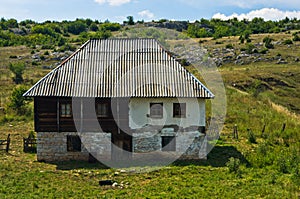 Old style stone and wood house at Pester plateau