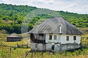 Old style stone and wood house at Pester plateau