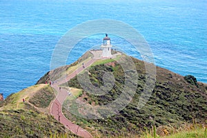 Old style white lighthouse at cape