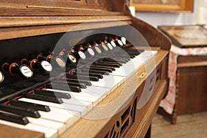 old styled and retro vintage harpsichord as background - very low DOF.