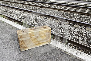 Old suitcase in a train station