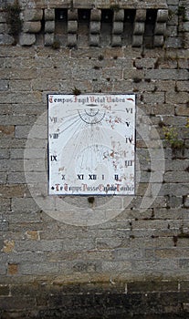 Old Sundial on a stone wall