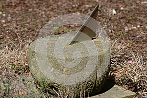 Old Sundial with womans face